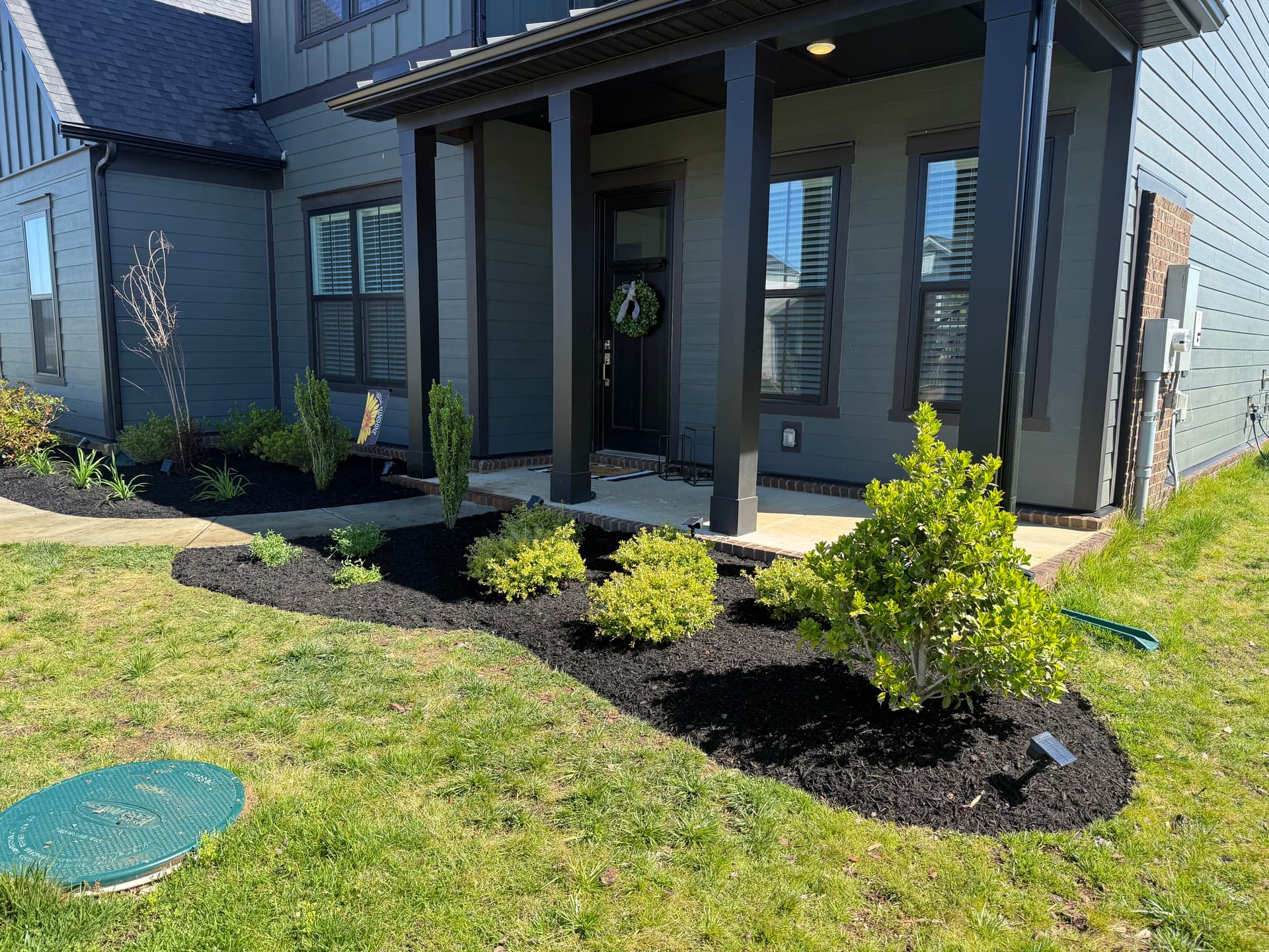 Fresh Mulch and New Plants Give This Front Yard a Sharper Look image