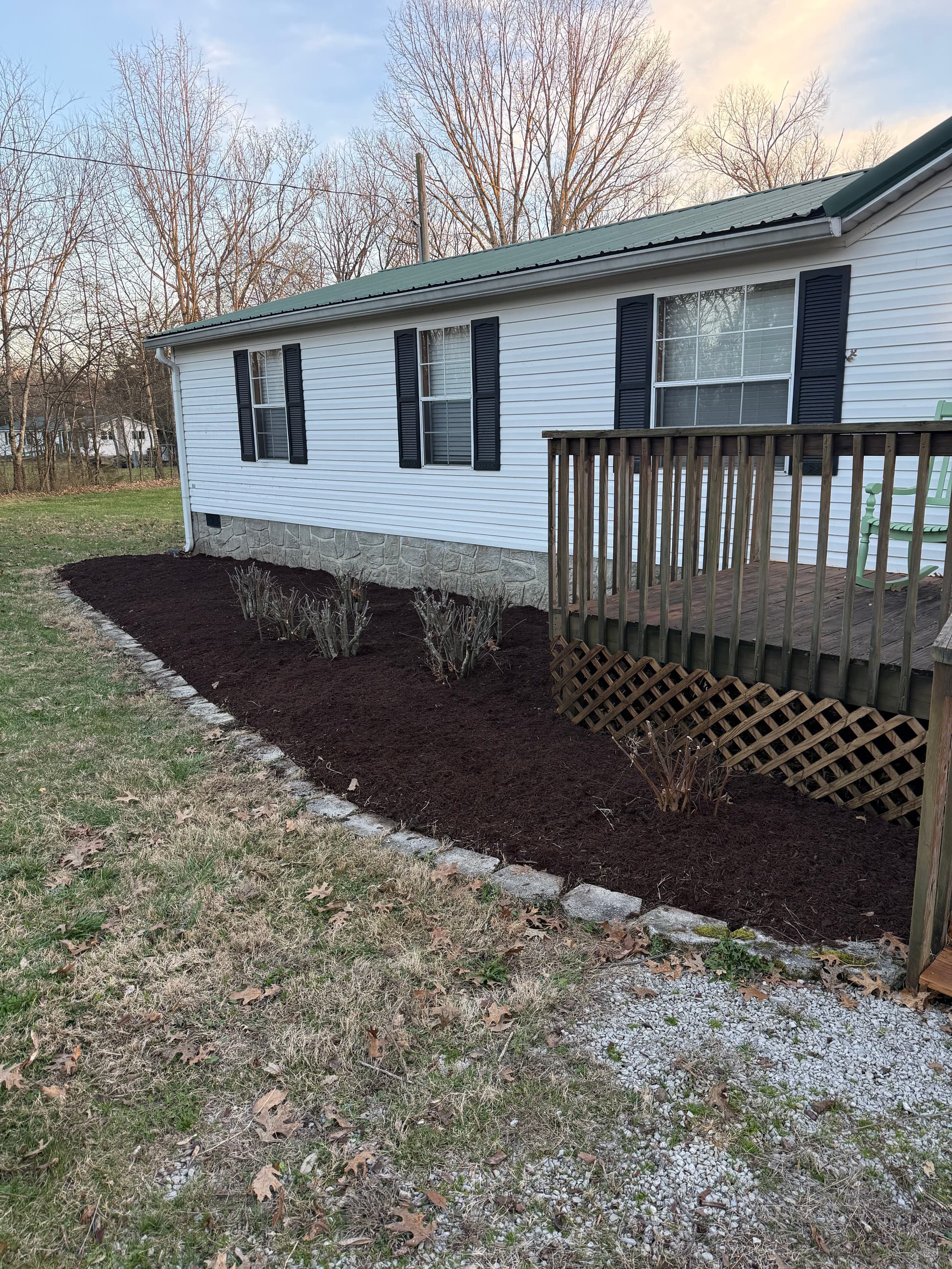 Fresh Mulch, Trimmed Bushes, and a Clean Mow All in One Visit image